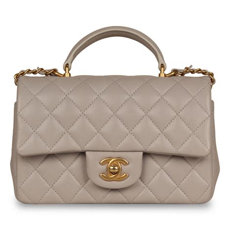 chanel mini bah|Chanel mini flap bag with top handle.